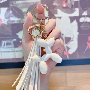 White Balloon Dog Tassel Pendant / Keychain Blu Spot Inc.